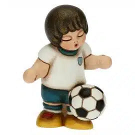 Bimbo calciatore palleggio piccolo