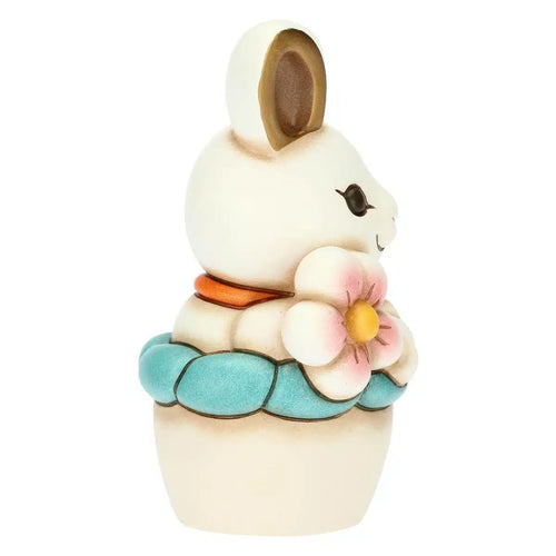 Coniglietta Joy simpatica nel vaso di fiori