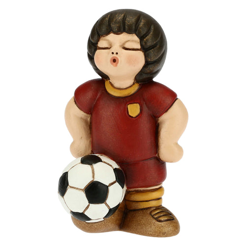 Bimbo calciatore giallo piccolo