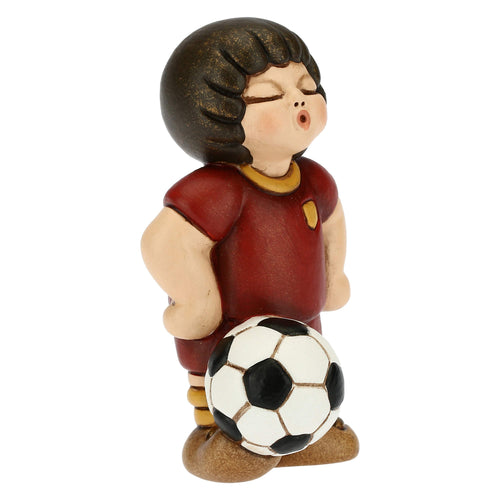 Bimbo calciatore giallo piccolo