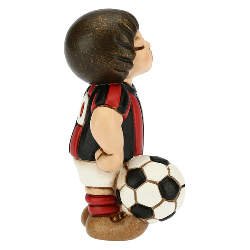 Bimbo calciatore nero piccolo
