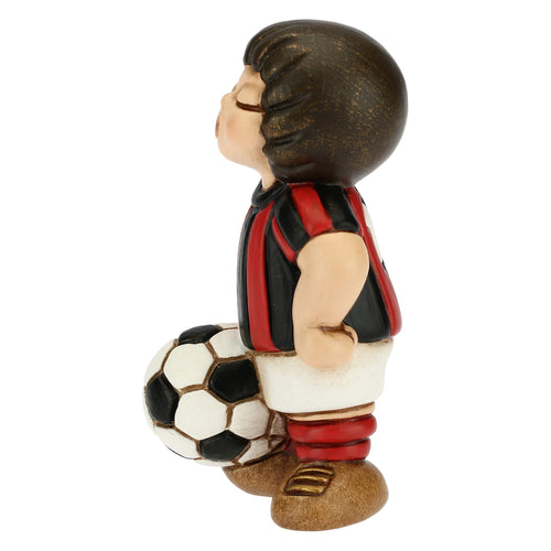 Bimbo calciatore nero piccolo
