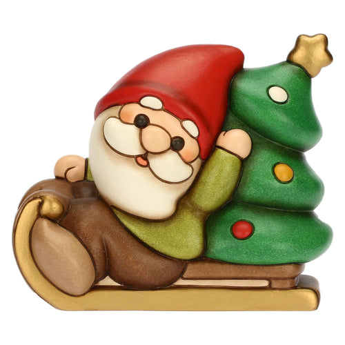 Gnomo Oliver su slitta con albero in ceramica