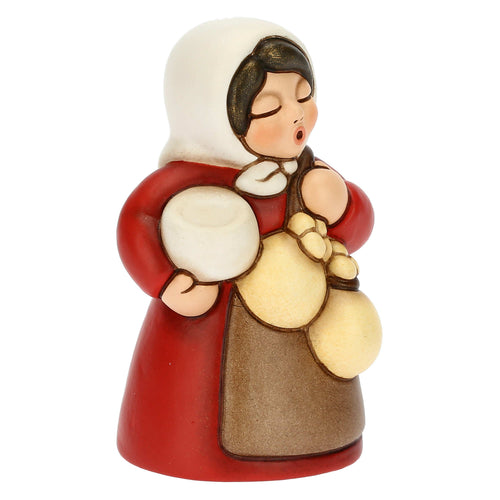 Donna con formaggio Presepe classico