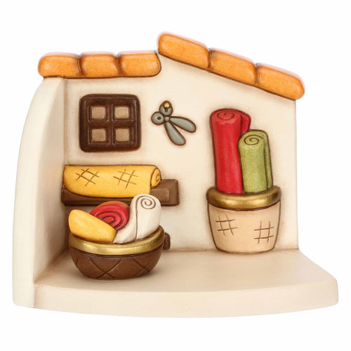 Bottega della sarta con cesti di stoffe in ceramica Presepe Classico