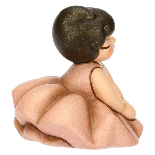 Ballerina rosa seduta in ceramica