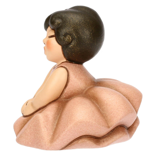 Ballerina rosa seduta in ceramica