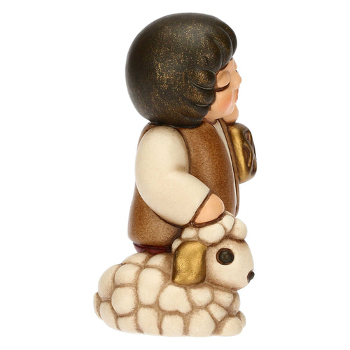 Bimbo con lanterna in ceramica Presepe Classico