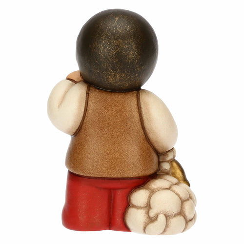 Bimbo con lanterna in ceramica Presepe Classico