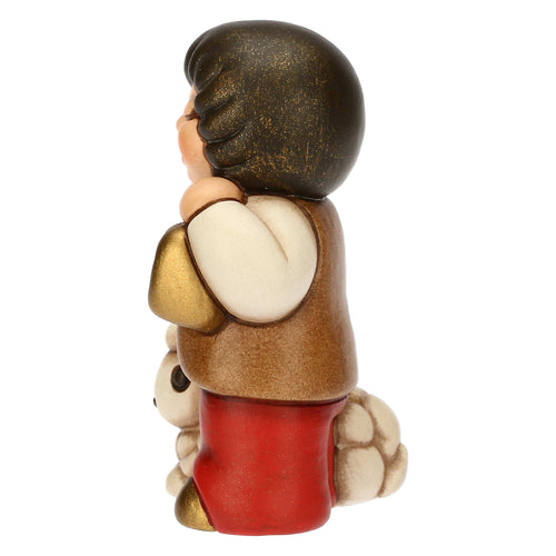 Bimbo con lanterna in ceramica Presepe Classico