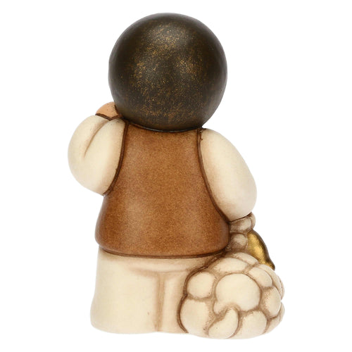 Bimbo con lanterna in ceramica Presepe Classico
