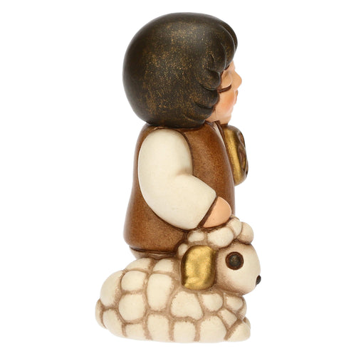 Bimbo con lanterna in ceramica Presepe Classico
