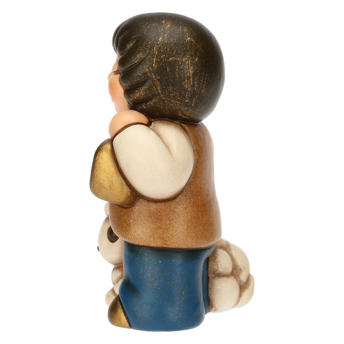 Bimbo con lanterna in ceramica Presepe Classico