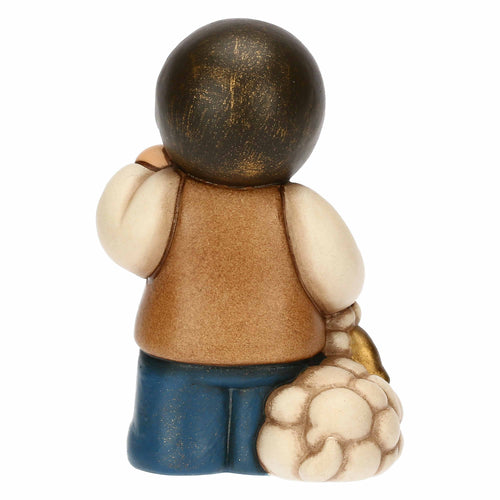 Bimbo con lanterna in ceramica Presepe Classico