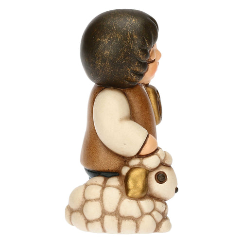 Bimbo con lanterna in ceramica Presepe Classico