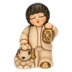 Bimbo con lanterna in ceramica Presepe Classico