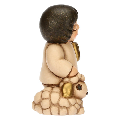 Bimbo con lanterna in ceramica Presepe Classico