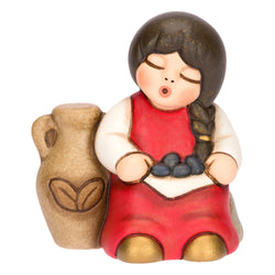 Bimba con olive in ceramica Presepe Classico, Rosso