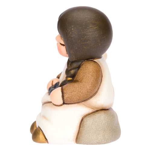 Bimba con olive in ceramica Presepe Classico, Bianco