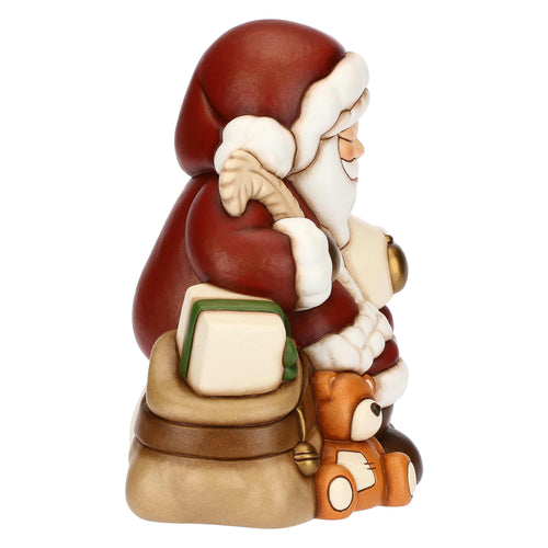 Babbo Natale con lista dei desideri in ceramica