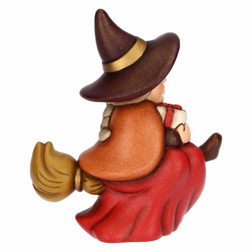 Befana Berta con regalo in ceramica, piccola