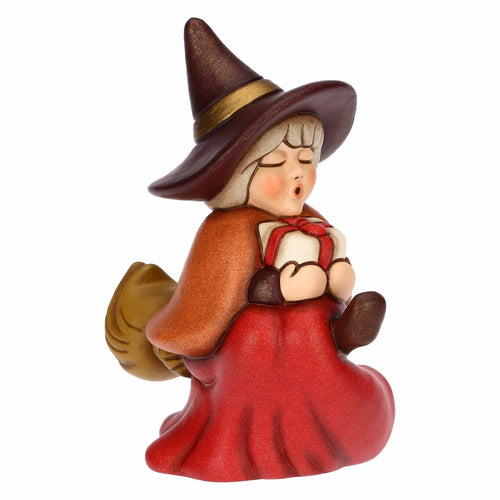 Befana Berta con regalo in ceramica, piccola