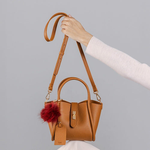 Mini borsa con pon pon