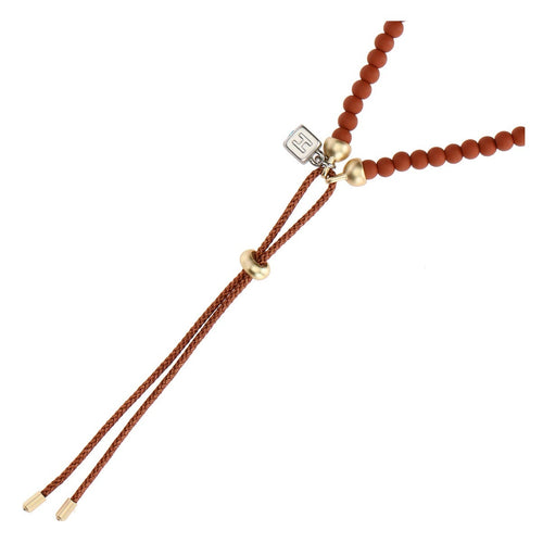 Bracciale con perline ceramiche e pendente albero della vita