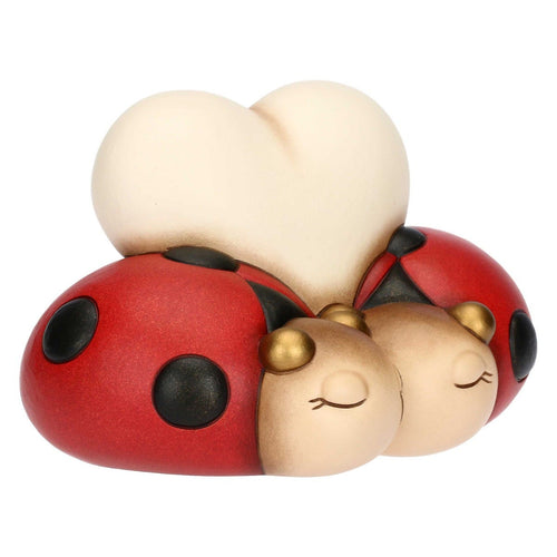 Coppia di coccinelle con cuore in ceramica